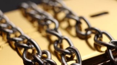 Close up of metal chain links conveying the message of power or entrapment