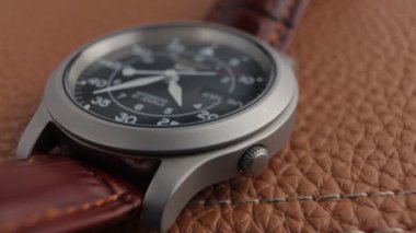 Close up of a fully automatic military watch with ticking hands