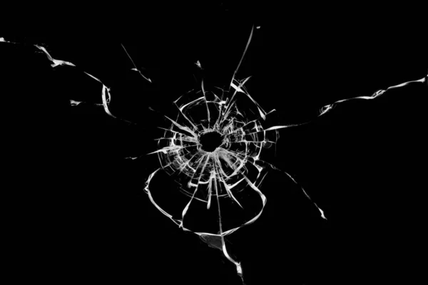 ガラス黒の背景に壊れた穴 — ストック写真