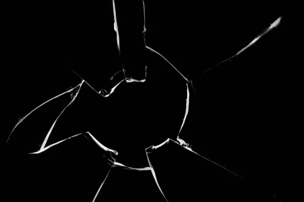 stock image Concept of broken glass with hole for design on black background