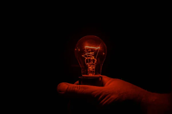 Light Incandescent Lamp Hands — Stock Photo, Image