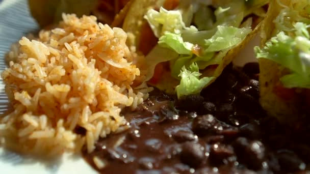 Mexican Food Taco Plate Rice Black Beans Cheese Taco Hard — Stock Video