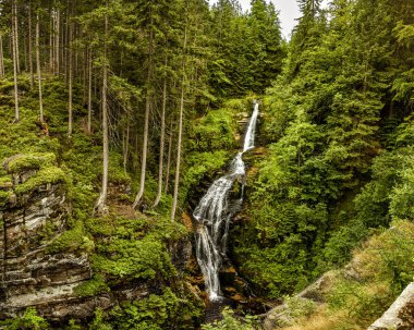 Waterfall in the mountains - Kamienczyka waterfall - Szklarska Poreba - Poland clipart