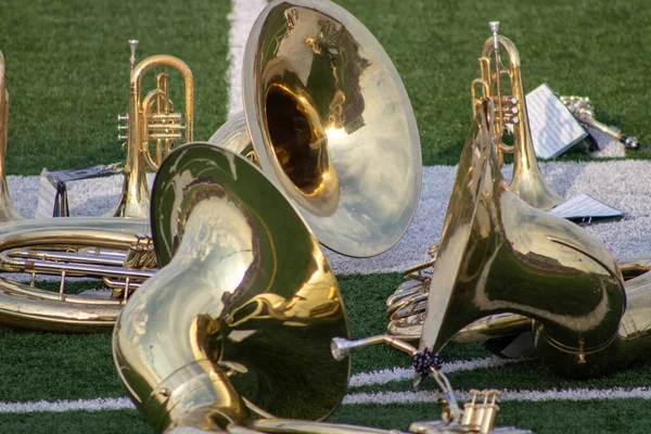 High school band instruments up close on foot ball . High quality photo