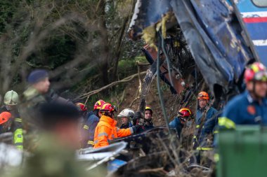 Tempi Valley, Greece - March 2, 2023: Tempi Valley, Greece - March 1, 2023: A tragic accident occurred in northern Greece, as two trains collided in the Tempi Valley. rescuers search the wreckage for survivors