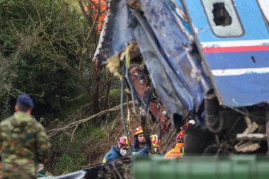 Tempi Valley, Greece - March 2, 2023: Tempi Valley, Greece - March 1, 2023: A tragic accident occurred in northern Greece, as two trains collided in the Tempi Valley. rescuers search the wreckage for survivors