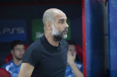 Athens, Greece - August 16,2023:: Manchester City coach Josep Guardiola during the Super Cup final soccer match between Manchester City and Sevilla at Stadio Karaiskakis, Piraeus clipart