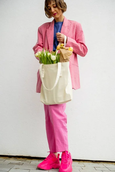 Stylish Woman Pink Suit Eco Handbag Flowers White Background Canvas — Foto Stock