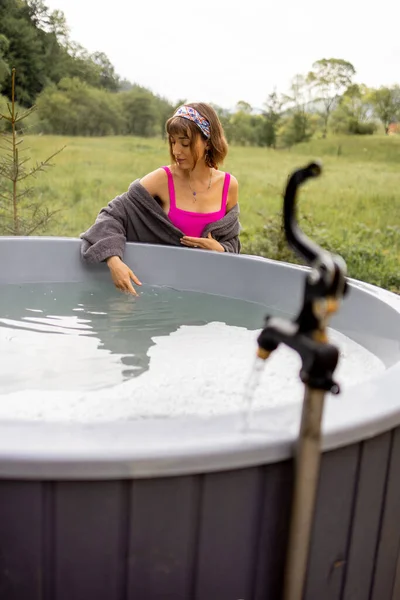 Woman Going Bath Hot Tub Checking Water Temperature While Resting — Stock Photo, Image