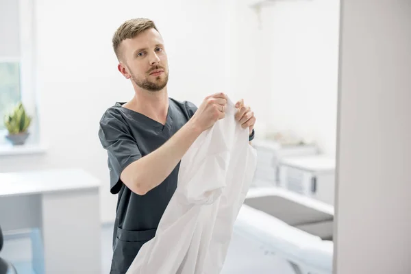 Portrait Young Male Doctor Practitioner Hanging Medical Gown Office — Stok Foto