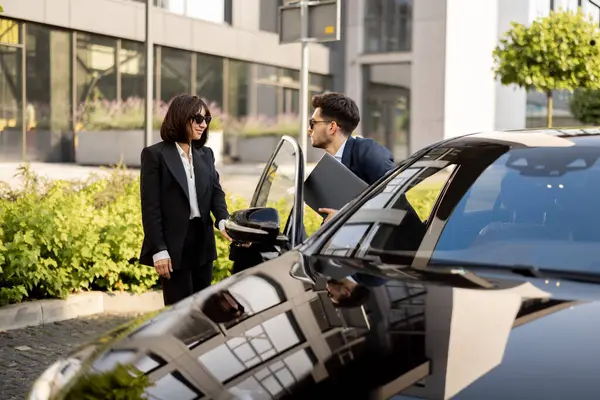 Female Chauffeur Helps Businessman Laptop Get Out Car Opening Door — Stock Photo, Image