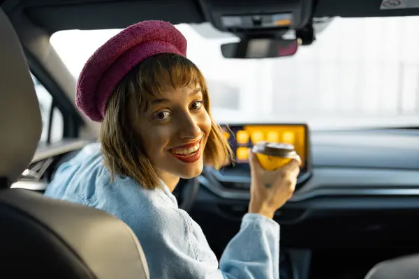 Stylish Woman Has Drink While Driving Modern Car City Concept Stock Photo