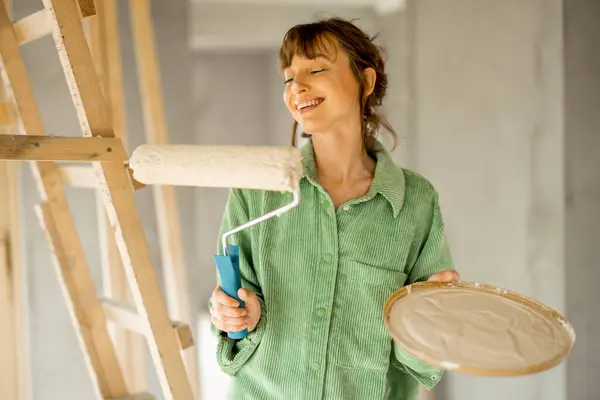 Portrait Young Joyful Cute Woman Standing Paint Roller Repairing Process Royalty Free Stock Images