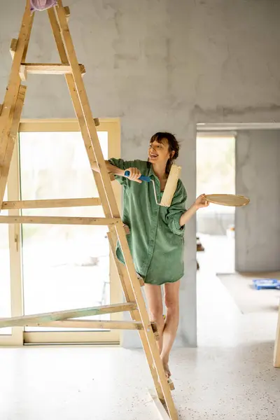 Portrait Young Cute Woman Standing Happily Ladder Paint Roller Repairing Royalty Free Stock Photos