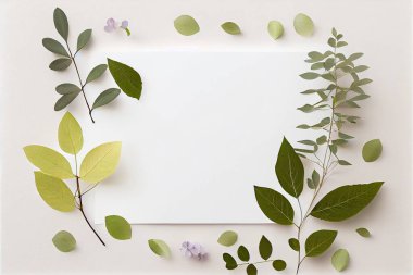 Clean blank for mockup on white background with spring leaves. Flat Lay style