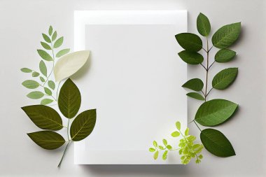 Clean blank for mockup on white background with spring leaves. Flat Lay style