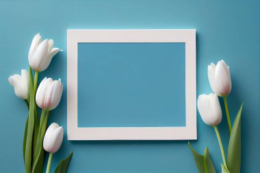 Clean blank frame for mockup on pastel blue background with tulips. Flat Lay style