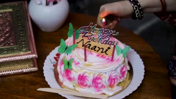 Maternal Grandmother Lighting Maternal Grandmother Candles Birthday Cake Coffee Table — Stock Video
