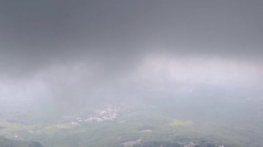 mountain flat covered with dense cloud at morning