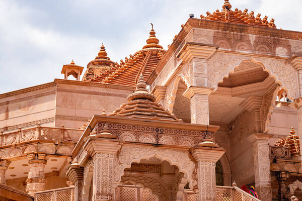 artistic red stone jain temple at morning from unique angle image is taken at Shri Digamber Jain Gyanoday Tirth Kshetra, Nareli Jain Mandir, Ajmer, Rajasthan, India.
