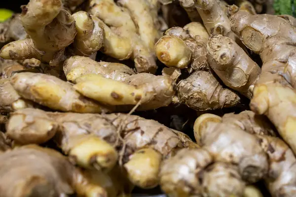 fresh ginger at vegetable store for sale at evening
