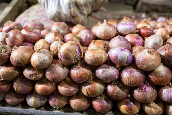 fresh onion from farm at vegetable store for sale at evening