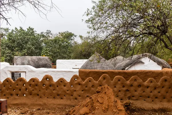 stock image traditional mud decorative wall at rural village home at day