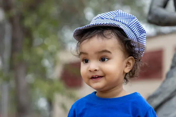 Stock image cute indian toddler outdoor portraits at day