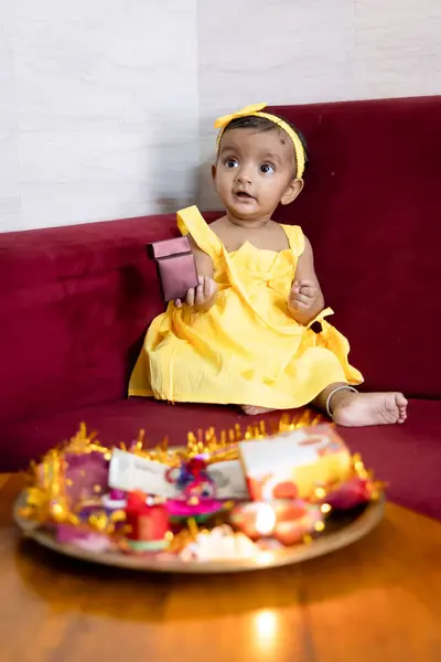 Stock image toddler cute expression on the occasion of hindu raksha bandhan festival at indoor