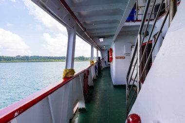 ship's observation gallery with serene sea view in daylight clipart