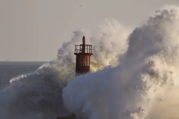 stock image Closeup of a sea storm at the Ave river mouth beacon, Vila do Conde, north of Portugal.