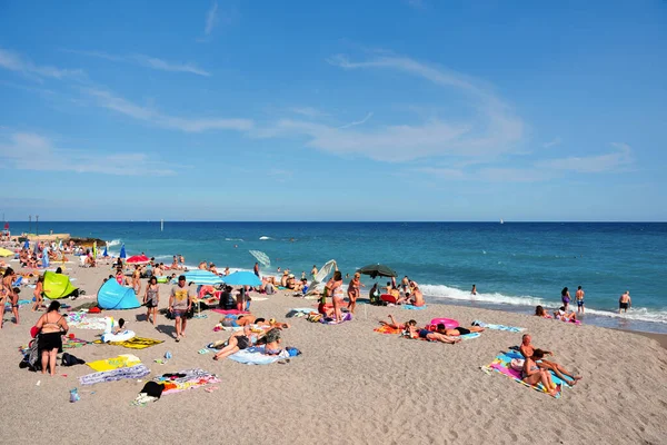 stock image coastal landscape and the bathers on the beach 1 July 2023 Borgio Verezzi Italy