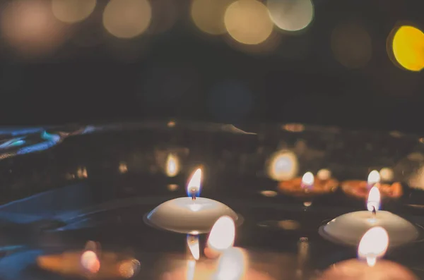 Burning Candles Floating Water Surface Dark European Christmas Tradition — Stock Photo, Image