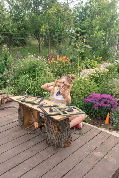 Adorable Blond Girl Sitting Garden Creating Lavender Framed Images — Stock Photo, Image