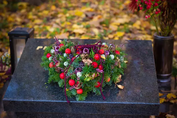 heart from flowers, decoration on grave