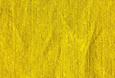 arkaplan olarak sarı renk kumaşı dokusu