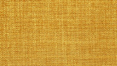Doğal keten dokusunun sarı arkaplanı. makro görünüm.