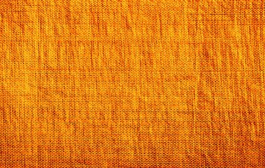 Sarı-turuncu kumaş. Doğal tekstil malzemesi. Tablo desenli arkaplan. 