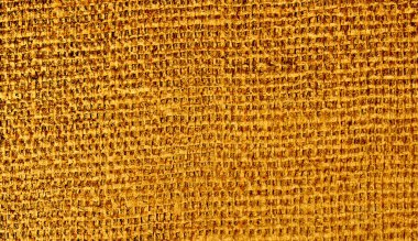 Altın desenli arka plan. sarı kumaş arkaplan.