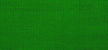 Arka plan olarak yeşil kumaş dokusu. yakın plan görünümü.