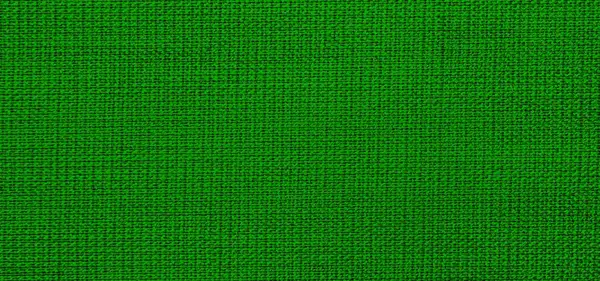 Arka plan olarak yeşil kumaş dokusu. yakın plan görünümü.