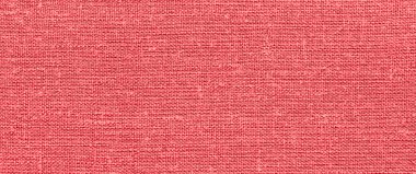 Pembe kumaş dokusunun arka planı. kırmızı kumaş dokusunun makro fotoğrafı. 