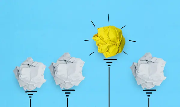 New idea, Creative idea, Inspiration and Innovation concepts with Paper light bulb