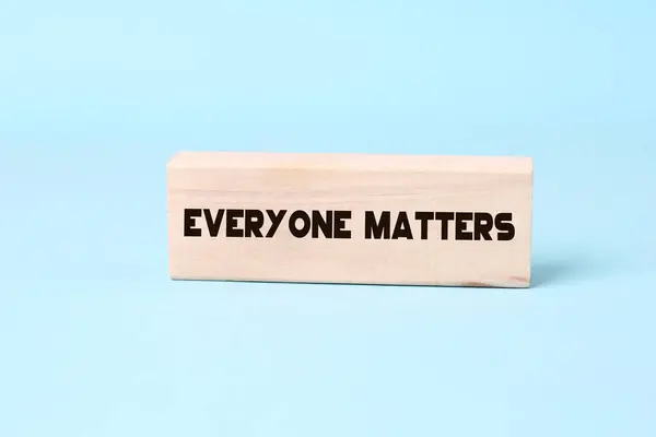 Everyone matters - phrase words from wooden blocks with letters, accepting others individuality everyone matters concept, top view