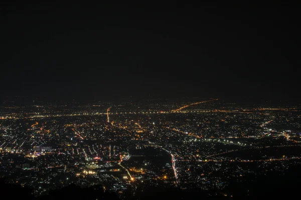 Night city scape at top view point of Chiang Mai, Thailand.