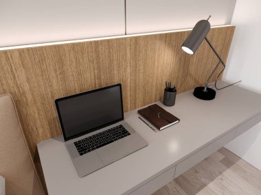  Yatak odasında okuma lambası olan gri masadaki dizüstü bilgisayar.