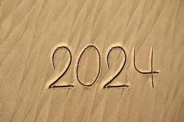 2024 Skriven Havets Sandstrand Stockfoto