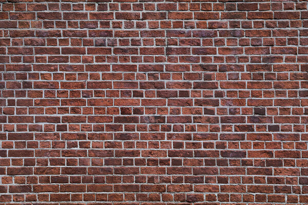 the background of the old red brick wall