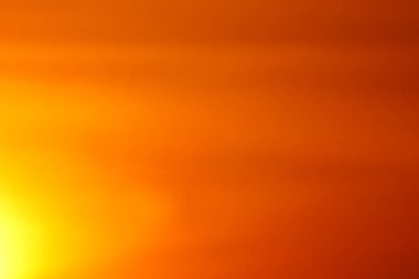 Bulanık odaklı soyut arka plan günbatımı gökyüzü kırmızı gökyüzü turuncu açık hava yaz doğası