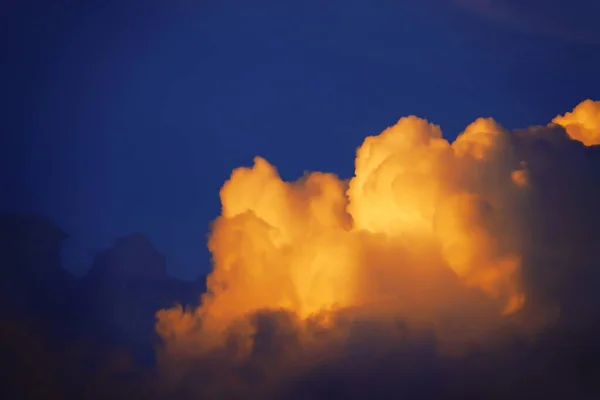Blur focus Sunset sky yellow clouds on a blue sky  background